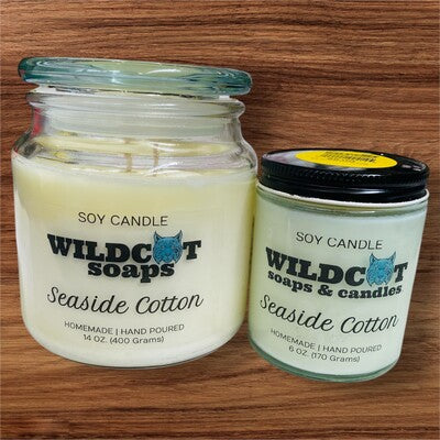 Velas perfumadas de algodón junto al mar